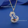 Nuevo Popular Otoño e Invierno Imprescindible Collar y Pendientes Naturales de Ojo de Tigre Perla Calabaza, Lujo Ligero, Gama Alta, Nicho, Versátil