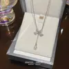 Colar de Laço de Pérola Design Feminino Sentido de Design Não Desbota Verão Nicho Sentido de Alto Padrão Versátil Corrente para Clavícula Joias de Aço Titânio