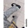 Calça jeans boca de sino com estampa jacquard all-over preta para homens, estilo high street europeu e americano, perna reta, caimento solto, calça casual de perna larga
