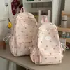 Mochila nueva de lunares estilo coreano para mujer 2026, mochila escolar ligera de gran capacidad para estudiantes, mochila linda de dibujos animados