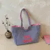 Bolsa de Gran Capacidad Transfronteriza para Mujer Verano 2026 Nuevo Versátil Moda Hombro Único Tendencia Viaje Diario Retro Casual Bolso Tote