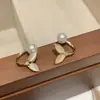 Brincos da Moda Estilo Coreano Mais Vendidos Novo Modelo Brincos Femininos Simples e Elegantes Versáteis Tiktok Mesmo Estilo Tarraxas Atacado