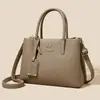 Bolso de mano pequeño cuadrado para mujer 2026, nuevo, minimalista y elegante, de cuero suave, moderno y versátil, bolso cruzado con estilo
