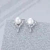 Comercio electrónico transfronterizo Aretes de botón de plata esterlina S925 para mujer, moda, aretes de perlas simples, soporte vacío DIY, fabricante de joyería