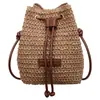 Bolso pequeño tejido para mujer 2026 nuevo estilo moderno nuevo versátil bandolera un hombro bolso de mano de moda bolso tipo cubo con cordón