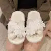 Pantuflas peludas de girasol estilo hada para mujer, moda versátil de otoño e invierno 2026, pantuflas planas de tira cruzada