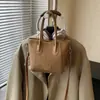 Bolsa de Mão Estilo Balde Tendência e Fashion para Mulheres, Nova Bolsa de Ombro Retro de Nicho Outono e Inverno com Sensação de Luxo, Bolsa Transversal