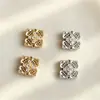 Nuevos colgantes de joyería estilo chino, accesorios de cobre fundido, accesorios para el cabello DIY, collares, piezas de colgante de flor con patrón de nube hueca tradicional