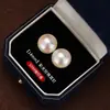 Brincos de Tarraxa com Pérola Grande e Agulha 999 Prata Swarovski para Mulheres 2026 Novos Brincos de Pérola Populares Brincos de Alto Padrão para Primavera e Verão para Mulheres