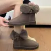Botas de nieve gruesas y versátiles de moda estilo páramo para mujer, modelo nuevo popular este año, gamuza con hebilla de cinturón, botas cálidas de algodón de doble uso