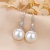 Cuentas de Concha Natural Son Comparables a las Perlas de Agua Dulce 12 mm Simples Elegantes Estilo Dama Elegante Aretes Aretes Aretes Mayoreo