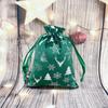 Bolsa de regalo navideña creativa de terciopelo con cordón, venta al por mayor, bolsa de almacenamiento portátil para dulces de Nochebuena.