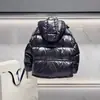 Versión Correcta m Home 23Ss Chaqueta de Plumas Corta de Tela de Nylon Barnizado para Hombres y Mujeres con Capucha Desmontable