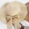 Sombrero de Playa de Borde Ancho Protección Solar para Viaje de Verano Cinta Ondulada Versátil Simple Sombrero de Sol Lazo Sombrero de Paja Venta al por Mayor