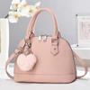 Nuevo bolso de mano tipo concha para mujer, bandolera de alta gama, estilo coreano, bolso cruzado sencillo y versátil.