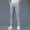 Calças casuais bonitas masculinas de negócios outono e inverno estilo coreano modernas versáteis soltas calças de terno Novas calças retas cropped