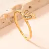 Anillo Transfronterizo Nuevo de Acero Inoxidable para Mujer Estilo Frío Dorado Simple Lujo Ligero Diamante Micro 1.5mm Anillo de Acero de Titanio Fábrica