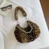 Bolso tipo dumpling esponjoso, simple y elegante, nuevo modelo otoño 2026, adecuado para el trabajo y los desplazamientos, bolso de hombro relajado y único