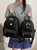 Nueva mochila con relieve en forma de corazón transfronteriza para estudiantes, bolsa ligera para viajes diarios, mochila pequeña de nicho de lujo ligero