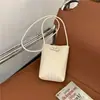 Comércio Exterior 2026 Nova Bolsa de Celular Casual Simples Estilo Coreano PU Moda Feminina Nicho Bolsa Transversal de Ombro Trançada Transfronteiriço