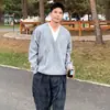 Suéter de punto gris de dos piezas falsas empalmadas con cuello en V para hombre en otoño, estilo coreano, top perezoso y relajado, suéter casual holgado