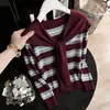 Conjunto de punto de dos piezas con estampado de letras para otoño e invierno, suéter de punto casual holgado de manga larga para mujer, nuevo modelo 2026