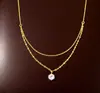 Collar de Acero Inoxidable Chapado en Oro de Doble Capa Colgante Sencillo de Diamante Único Cadena de Cuello Apilada de Moda Cadena para Clavícula Venta al por Mayor Transfronteriza