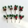 Suministro transfronterizo de Navidad: ramas de plantas artificiales, agujas de pino, ramas de flores, accesorios, decoraciones festivas, plantas artificiales, bayas rojas, ramas de frutas