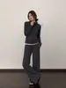 Conjunto deportivo de chaqueta a rayas estilo coreano y pantalones casuales para mujer, atuendo completo nuevo para principios de otoño 2026, estilo relajado