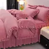 2026 Novo Conjunto de Cama de Veludo Leite Liso Estilo Coreano com Renda Saia de Cama e Lençol de Elástico Conjunto de Quatro Peças Capa de Edredom Individual Transmissão ao Vivo