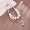 Collar de perlas grandes de agua dulce exageradas de estilo europeo y americano para mujer, cadena de clavícula avanzada con diseño de nicho de lujo ligero, cadena de lana