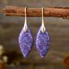 Nuevos pendientes colgantes de hojas de piedra natural bohemios europeos y americanos de moda, joyería retro de estación independiente transfronteriza.