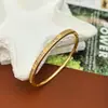 [Chapado en Cobre con Oro Real] Pulsera Cruzada de Gypsophila Transfronteriza, Lujo Accesible Personalizado Pulsera de Moda de Trébol de Cuatro Hojas Completamente Diamantada 18K