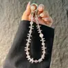 Alça de Celular Cristal de Satélite Super Brilhante, Corda de Pulso Luxuosa Anti-Perda, Cordão de Celular Versátil, Pingente de Bolsa Estilo Pulso