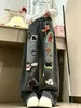 Pantalones de mezclilla lavados con bordado de toalla de dibujos animados Chao Li Youhuo para mujer, estilo de calle alta de otoño, holgados, de pierna ancha, hasta el suelo