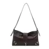 Bolso versátil de alta gama, bolso de hombro elegante para mujer, bolso de mano casual simple nuevo, bolso de hombro retro de nicho