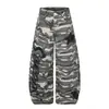 Pantalones anchos de camuflaje retro americano de alta costura, nueva colección de otoño, diseño recto holgado y casual con un distintivo dobladillo curvo, para hombres y mujeres