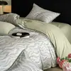 Juego de ropa de cama de cuatro piezas de algodón puro cepillado Clase A, ropa de cama de algodón de alta gama, funda de edredón gruesa, juego de tres piezas para estudiantes, sábana plana y sábana bajera