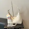 Bolso bandolera de gran capacidad de alta gama para mujer para primavera y verano, nuevo modelo 2026, bolso blanco con cremallera en forma de dumpling para debajo del brazo