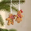 Nuevos adornos navideños transfronterizos, adornos colgantes, guirnaldas, casitas de jengibre DIY, colgantes navideños de resina de hombre de jengibre