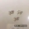 Arte de Uñas Transfronterizo Ultra Brillante Circonita Lazo Plateado Decoración de Uñas Celebridad de Internet Popular Venta Caliente Mariposa Pequeña Accesorios para Uñas Al por Mayor