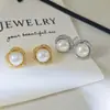 Pendientes Franceses de Lujo Accesible con Circonita Redonda de Alto Grado con Forma de Nido de Pájaro Diseño de Nicho Aguja de Plata de Ley S925 Pendientes de Perla de Agua Dulce Natural
