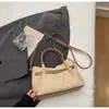 Bolso de mano vintage de ante transfronterizo para mujer, nuevo bolso tipo cubo de alta moda de tendencia, bolso de hombro y cruzado de gran capacidad