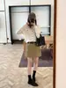 Saia Curta A-Line Han Xun Light Estilo Retro Americano de Cintura Alta Emagrecedora com Bolsos Workwear Tridimensionais para Mulheres, Novo Estilo Outono 2026 27197