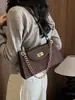 Bolso de cadena de lujo de alta gama, ligero, para mujer, diseño nuevo, estilo de nicho, adecuado para ir al trabajo, se puede llevar debajo del brazo o usar como bolso de hombro o bolso cruzado