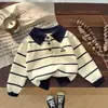 Suéter de Punto a Rayas con Cuello Polo Estilo Coreano para Niños 2026 Nuevo Otoño/Invierno Niños y Niñas Suéter para Bebé Suéter con Solapas Top