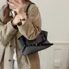 Bolsa rayada de gran capacidad para mujer, nuevo bolso de hombro versátil 2026, bolso tote de estilo coreano súper popular para el día a día