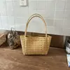 Bolso tote tejido hueco súper popular transfronterizo para mujer, nuevo bolso de hombro exquisito 2026, bolso de playa casual para vacaciones