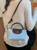 Bolsa de Ombro Color Block Estilosa Nova de Verão 2026 Transfronteiriça para Mulheres, Bolsa Transversal de Ombro Único Nicho, Bolsa Simples para Celular
