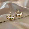 Pendientes elegantes y sencillos de perla con forma de corazón para mujer, diseño de nicho de lujo ligero, alta gama, Corea del Sur, pendientes y joyas para las orejas que combinan con todo.